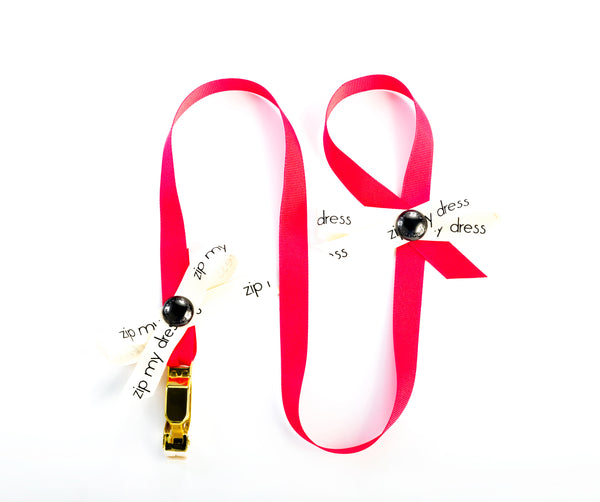 <strong>zip my dress<sup>®</sup></strong> Pink ribbon
